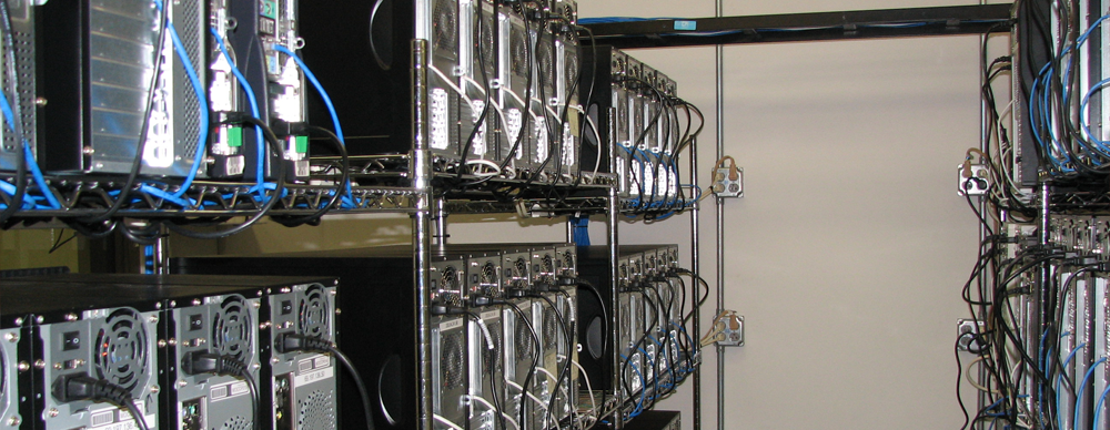 Rows of web hosting server racks and network cabling
